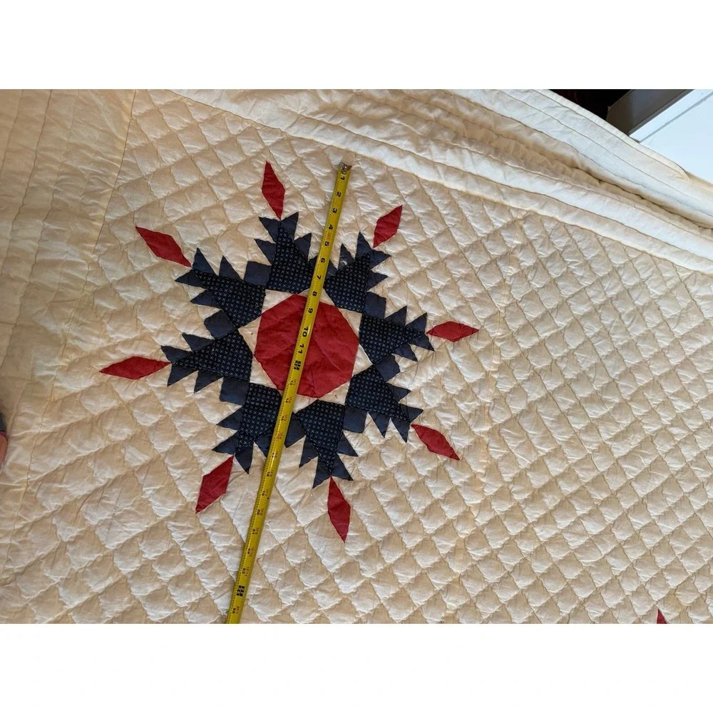 Large Snowflake quilt. In Americana colors. Hand sewn